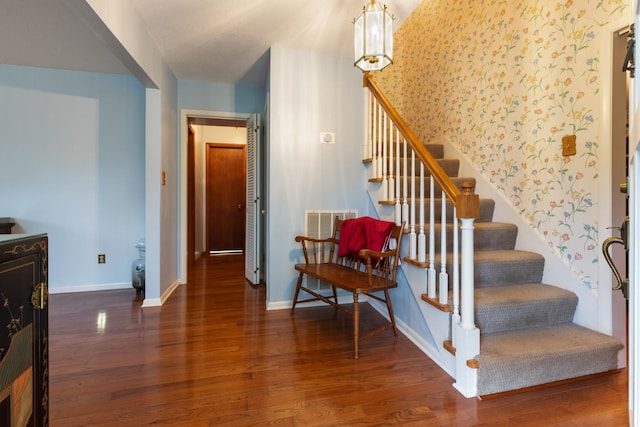103 Forrest Hills Dr, Dickson, TN 37055 - staircase featuring wallpapered walls, wood finished floors, and baseboards