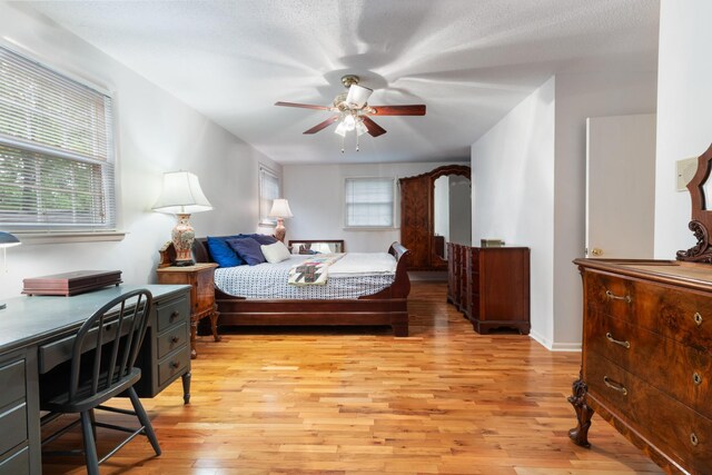 103 Forrest Hills Dr, Dickson, TN 37055 - bedroom featuring light wood-type flooring, a ceiling fan, and baseboards