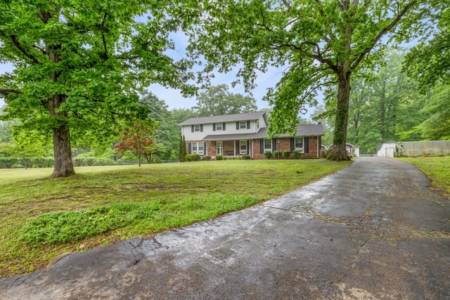 103 Forrest Hills Dr, Dickson, TN 37055 - traditional home featuring brick siding and driveway