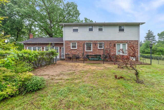 103 Forrest Hills Dr, Dickson, TN 37055 - rear view of property with a patio area and brick siding