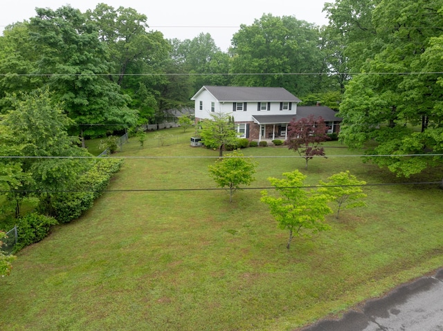 103 Forrest Hills Dr, Dickson, TN 37055 - view of front of house featuring brick siding and a front lawn