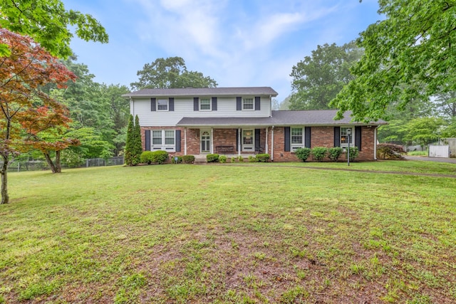 103 Forrest Hills Dr, Dickson, TN 37055 - traditional home with brick siding and covered porch