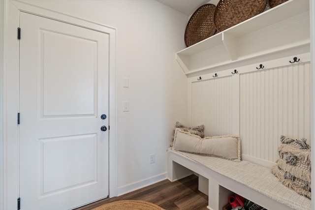 mudroom with baseboards and dark wood-style flooring