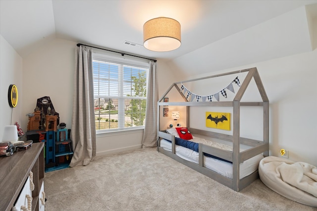 bedroom featuring lofted ceiling, carpet, and baseboards