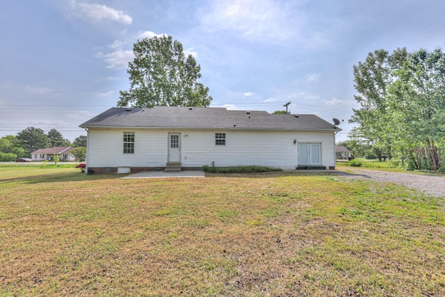 1716 Golden Valley Dr, Christiana, TN 37037 - rear view of house featuring entry steps, a lawn, and a patio