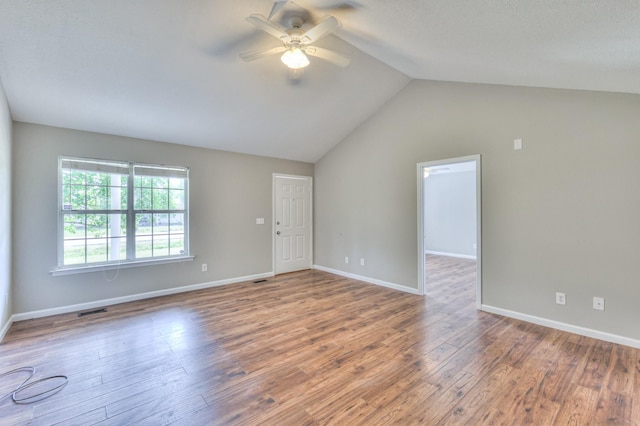 1716 Golden Valley Dr, Christiana, TN 37037 - unfurnished living room featuring ceiling fan, wood finished floors, lofted ceiling, and baseboards