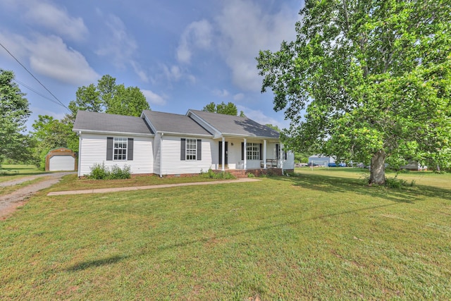 1716 Golden Valley Dr, Christiana, TN 37037 - single story home with a porch, an outdoor structure, a front yard, and dirt driveway
