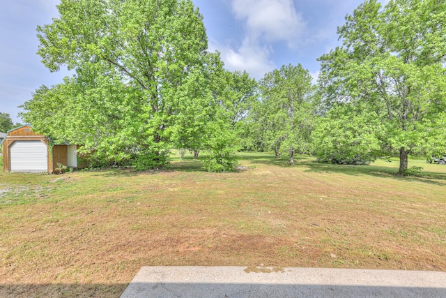 1716 Golden Valley Dr, Christiana, TN 37037 - view of green lawn with an outbuilding
