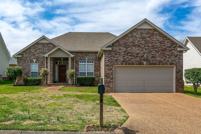 traditional-style home with brick siding, driveway, a shingled roof, and a front lawn