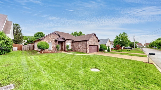 2014 Patrick Way, Spring Hill, TN 37174 - view of front of property featuring concrete driveway, brick siding, and an attached garage