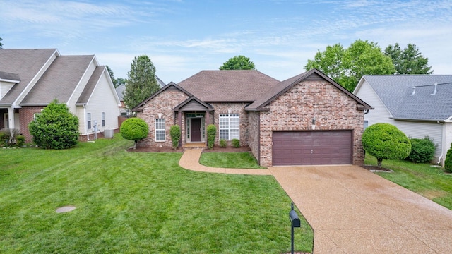 2014 Patrick Way, Spring Hill, TN 37174 - view of front facade featuring brick siding, driveway, an attached garage, and a front lawn