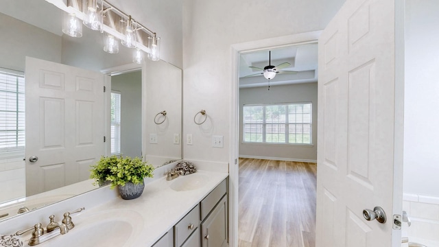 2014 Patrick Way, Spring Hill, TN 37174 - full bathroom featuring wood finished floors, a ceiling fan, double vanity, and baseboards