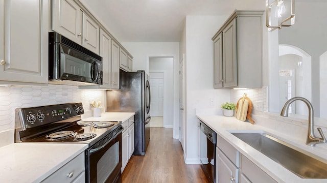 2014 Patrick Way, Spring Hill, TN 37174 - kitchen with black appliances, a sink, gray cabinets, wood finished floors, and light countertops