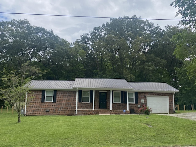 148 Shawna Ln, Hillsboro, TN 37342 - single story home with a garage, metal roof, a front yard, and dirt driveway
