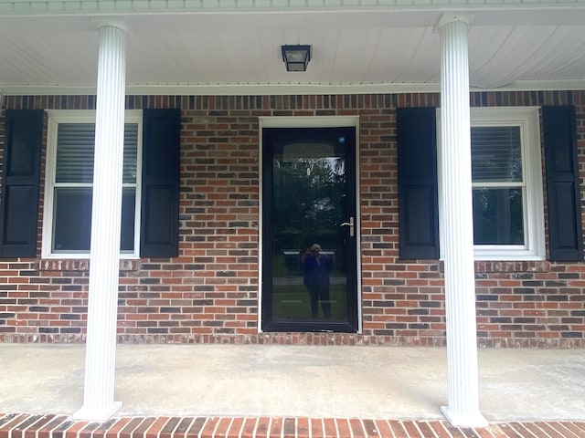 148 Shawna Ln, Hillsboro, TN 37342 - property entrance featuring brick siding and a porch