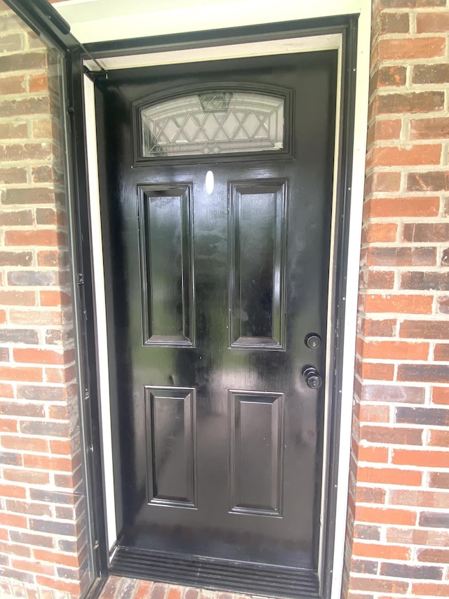 148 Shawna Ln, Hillsboro, TN 37342 - view of exterior entry featuring brick siding