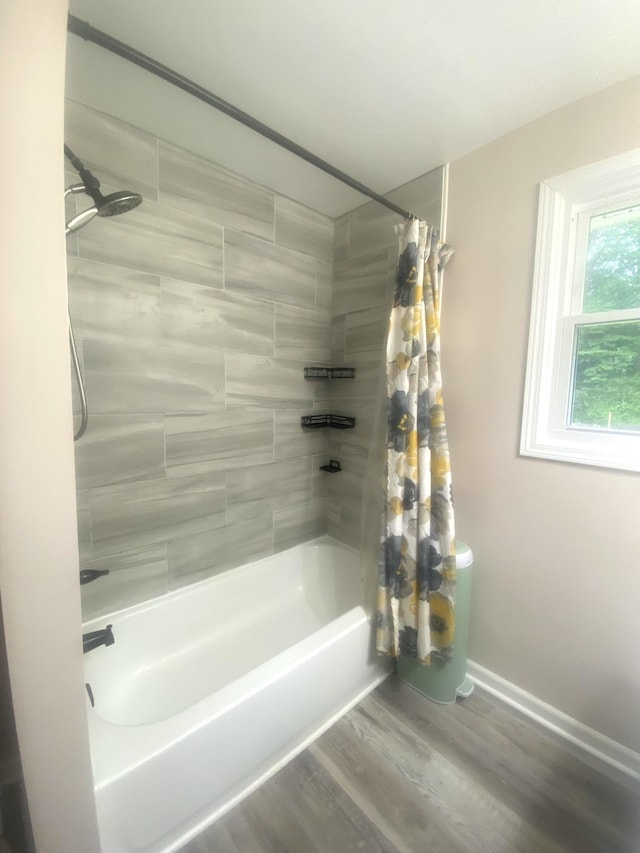 148 Shawna Ln, Hillsboro, TN 37342 - full bathroom with shower / tub combo with curtain, wood finished floors, and baseboards