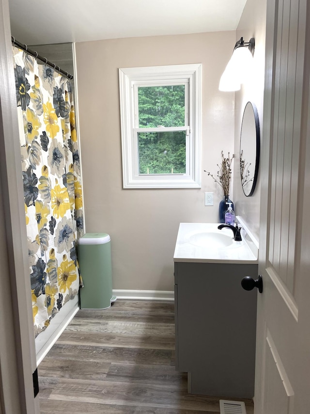 148 Shawna Ln, Hillsboro, TN 37342 - bathroom with vanity, a shower with shower curtain, baseboards, and wood finished floors