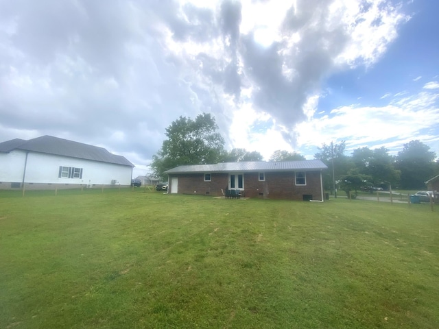 148 Shawna Ln, Hillsboro, TN 37342 - back of property featuring brick siding and crawl space