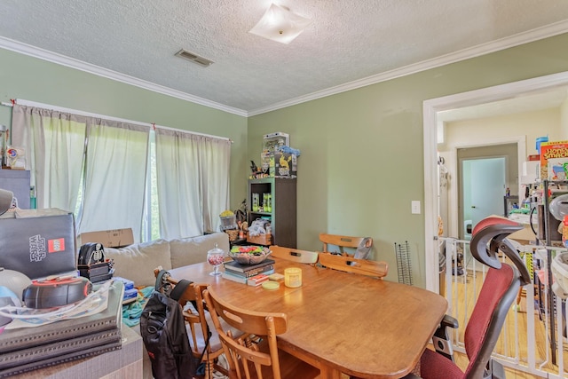 3913 Pickering Ave, Chattanooga, TN 37415 - dining space featuring ornamental molding and a textured ceiling