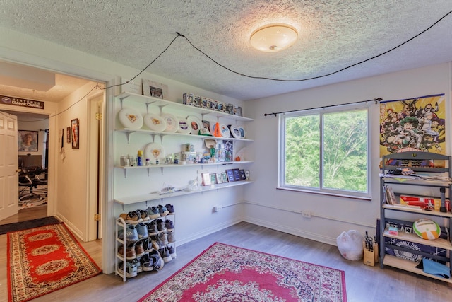 3913 Pickering Ave, Chattanooga, TN 37415 - interior space with wood finished floors, a textured ceiling, and baseboards