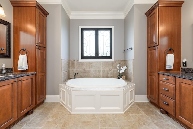 109 Allenhurst Cir, Franklin, TN 37067 - bathroom featuring a garden tub, crown molding, vanity, and baseboards