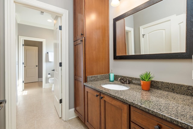 109 Allenhurst Cir, Franklin, TN 37067 - bathroom featuring crown molding, vanity, toilet, baseboards, and tile patterned flooring