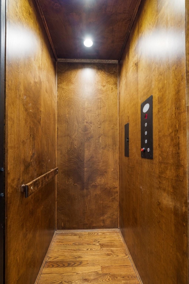 109 Allenhurst Cir, Franklin, TN 37067 - elevator with wood finished floors, wood walls, and recessed lighting