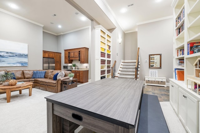 109 Allenhurst Cir, Franklin, TN 37067 - kitchen with stainless steel appliances, brown cabinetry, crown molding, recessed lighting, and a sink