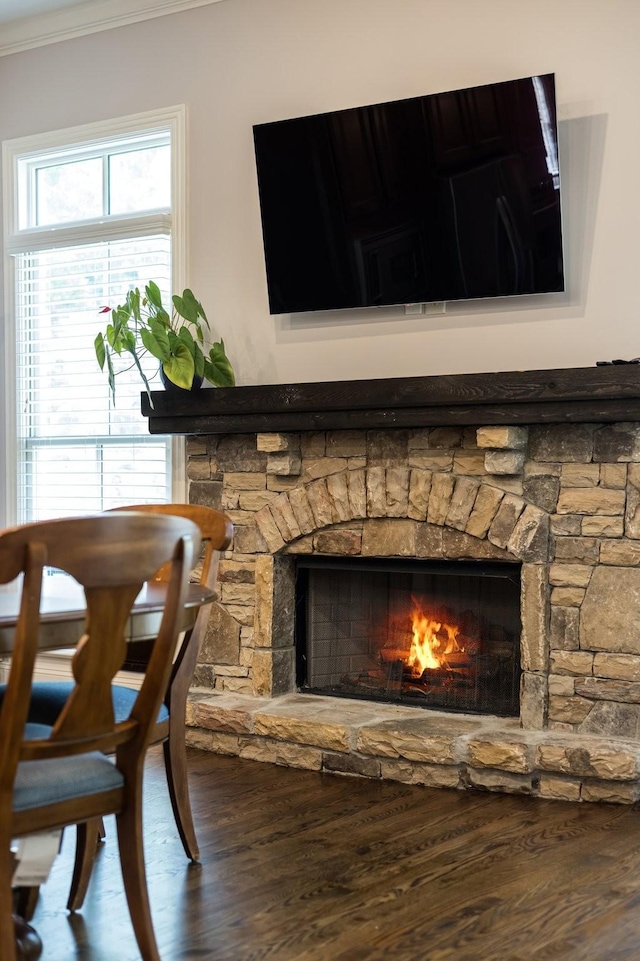 109 Allenhurst Cir, Franklin, TN 37067 - detailed view of crown molding, a stone fireplace, and wood finished floors