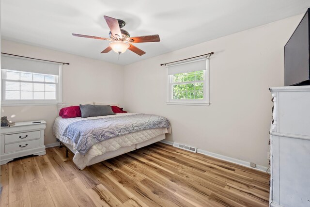1403 Manor Rd, Columbia, TN 38401 - bedroom featuring light wood-style flooring, baseboards, and ceiling fan