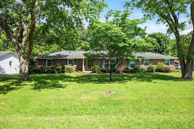 1403 Manor Rd, Columbia, TN 38401 - single story home featuring brick siding and a front lawn