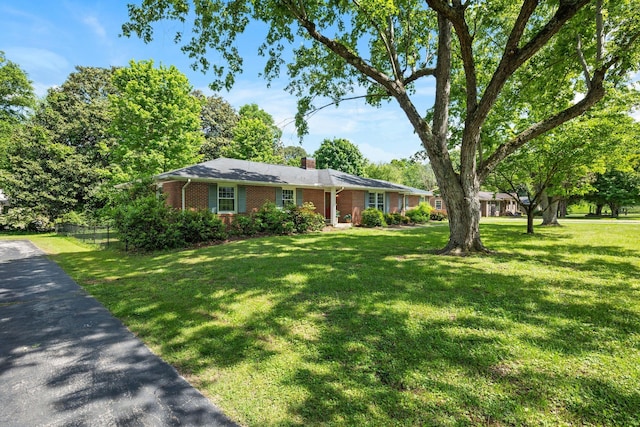 1403 Manor Rd, Columbia, TN 38401 - ranch-style home with brick siding and a chimney
