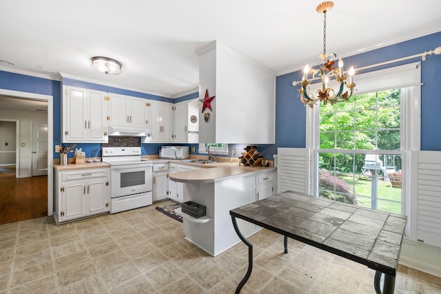 1403 Manor Rd, Columbia, TN 38401 - kitchen featuring white appliances, a chandelier, light countertops, a peninsula, and ornamental molding