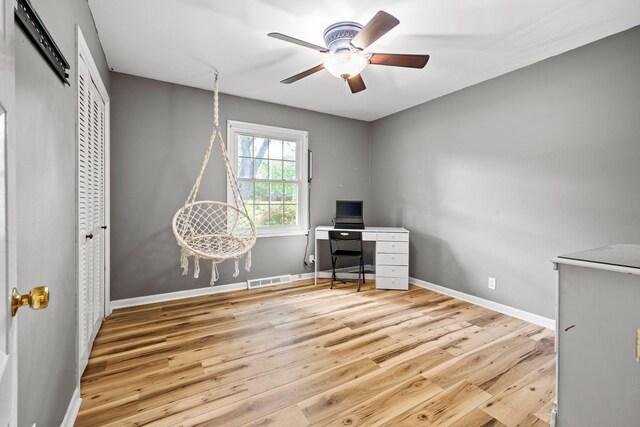 1403 Manor Rd, Columbia, TN 38401 - unfurnished office with ceiling fan, wood finished floors, and baseboards