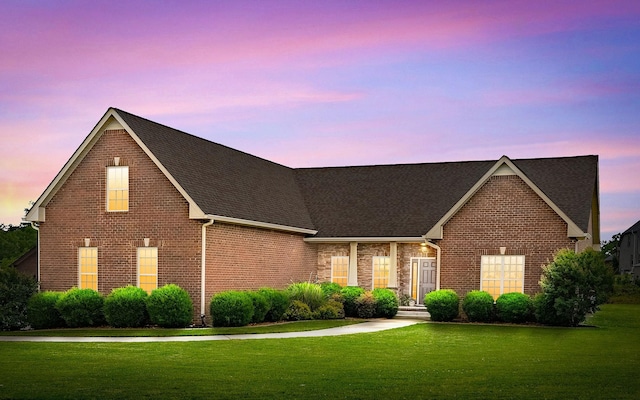 963 Red Bluff Way, Adams, TN 37010 - view of front of property featuring a front lawn, brick siding, and roof with shingles