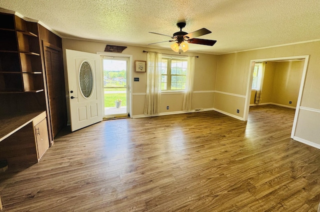 202 Tomlinson Rd, Lebanon, TN 37087 - entrance foyer featuring a textured ceiling, ceiling fan, dark wood-style flooring, ornamental molding, and baseboards