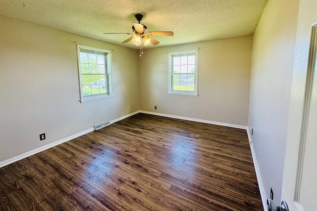 202 Tomlinson Rd, Lebanon, TN 37087 - empty room with a ceiling fan, dark wood-style floors, a textured ceiling, and baseboards