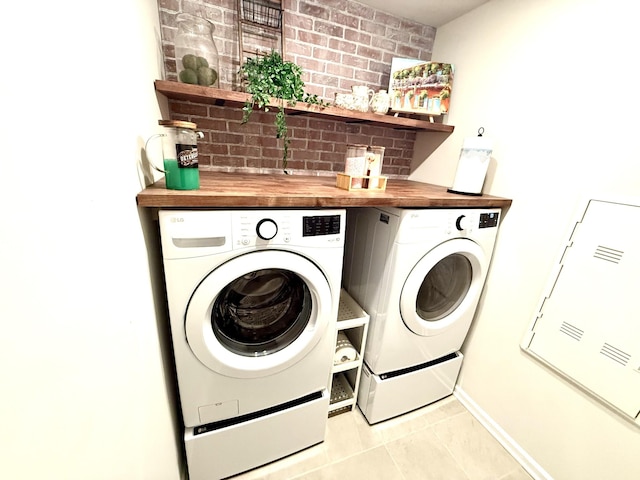 4524 Hoboken Way, Murfreesboro, TN 37128 - laundry room with washer and clothes dryer and light tile patterned floors
