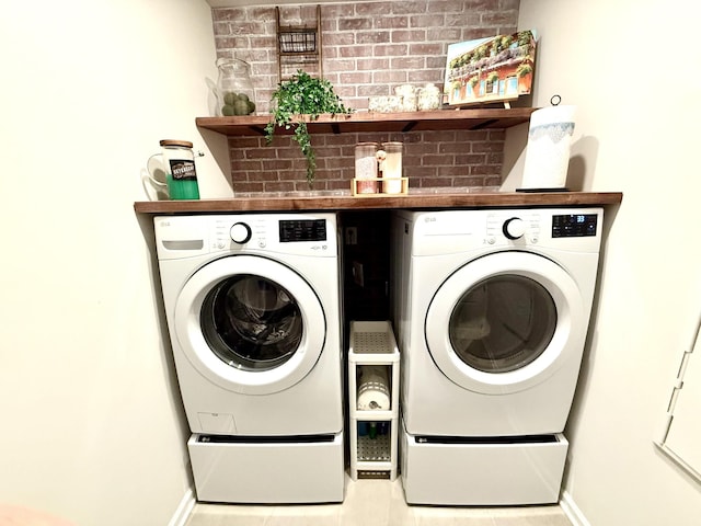4524 Hoboken Way, Murfreesboro, TN 37128 - clothes washing area with washing machine and clothes dryer and baseboards