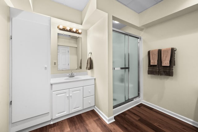6716 Autumnwood Dr, Nashville, TN 37221 - bathroom with wood finished floors, a shower stall, and baseboards