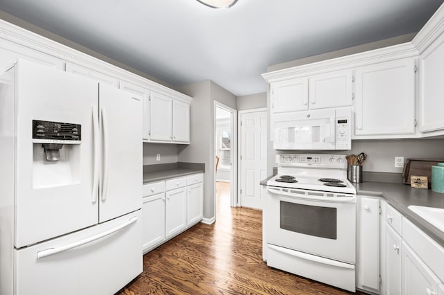 6716 Autumnwood Dr, Nashville, TN 37221 - kitchen with white appliances, dark wood finished floors, and white cabinetry