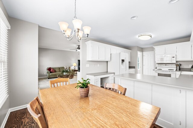 6716 Autumnwood Dr, Nashville, TN 37221 - dining space with baseboards, a chandelier, and ceiling fan