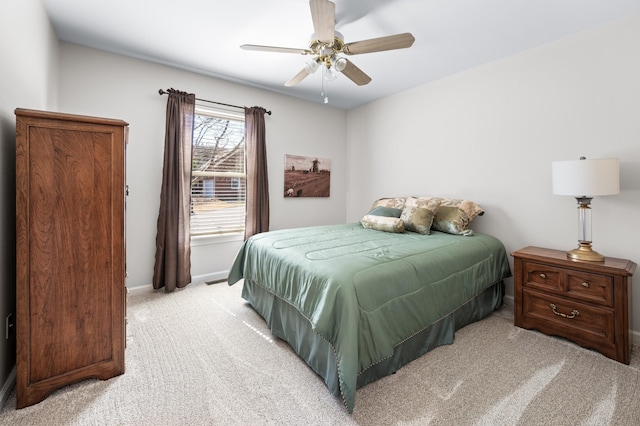 6716 Autumnwood Dr, Nashville, TN 37221 - bedroom with light colored carpet, baseboards, and a ceiling fan