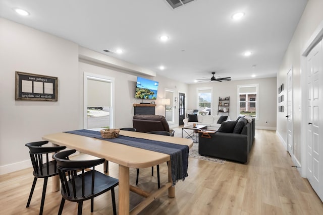 178 Charleston Ave, Pleasant View, TN 37146 - dining area featuring ceiling fan, a fireplace, recessed lighting, baseboards, and light wood-style flooring