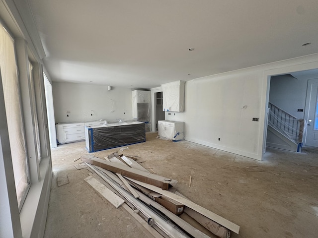 601 Galaxie Dr, Nashville, TN 37209 - unfurnished living room featuring stairs