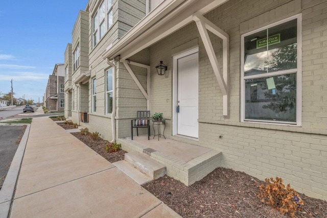 1587 Adams St, Chattanooga, TN 37408 - doorway to property with brick siding