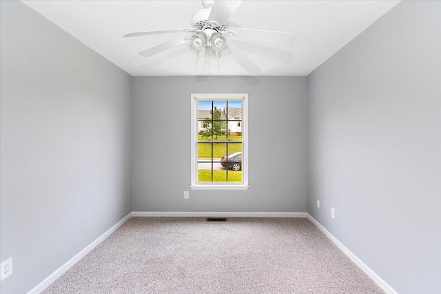 2129 Hollandale Cir, Columbia, TN 38401 - unfurnished room featuring a ceiling fan, carpet floors, and baseboards