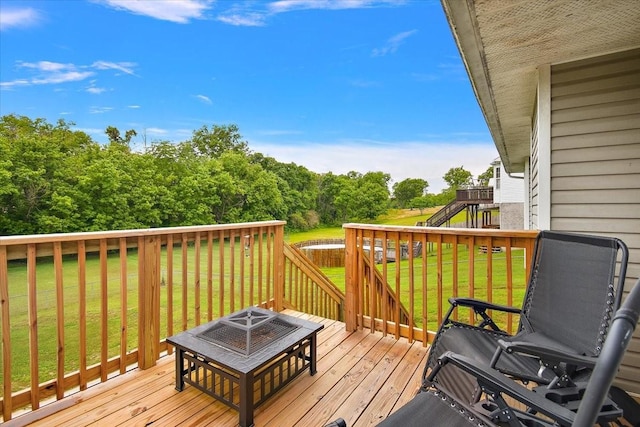 2129 Hollandale Cir, Columbia, TN 38401 - wooden terrace featuring a lawn, an outdoor fire pit, and stairs