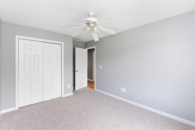 2129 Hollandale Cir, Columbia, TN 38401 - unfurnished bedroom with a closet, baseboards, carpet, and a ceiling fan